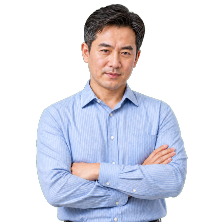 Confident Chinese professional standing with arms crossed